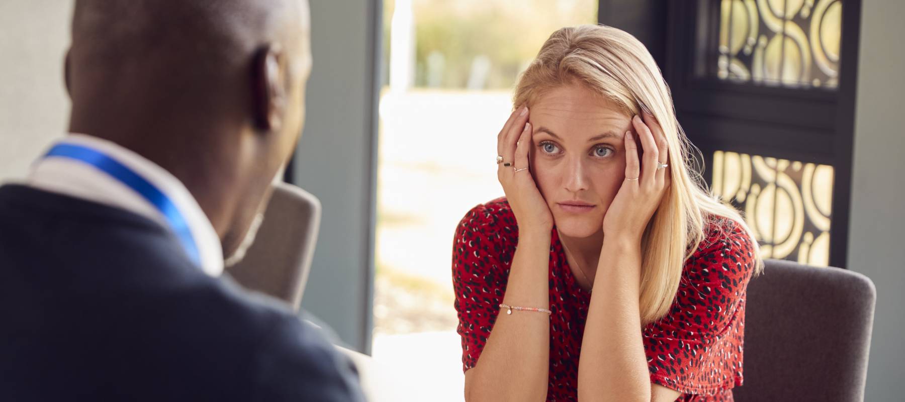 A woman has a meeting with a man.