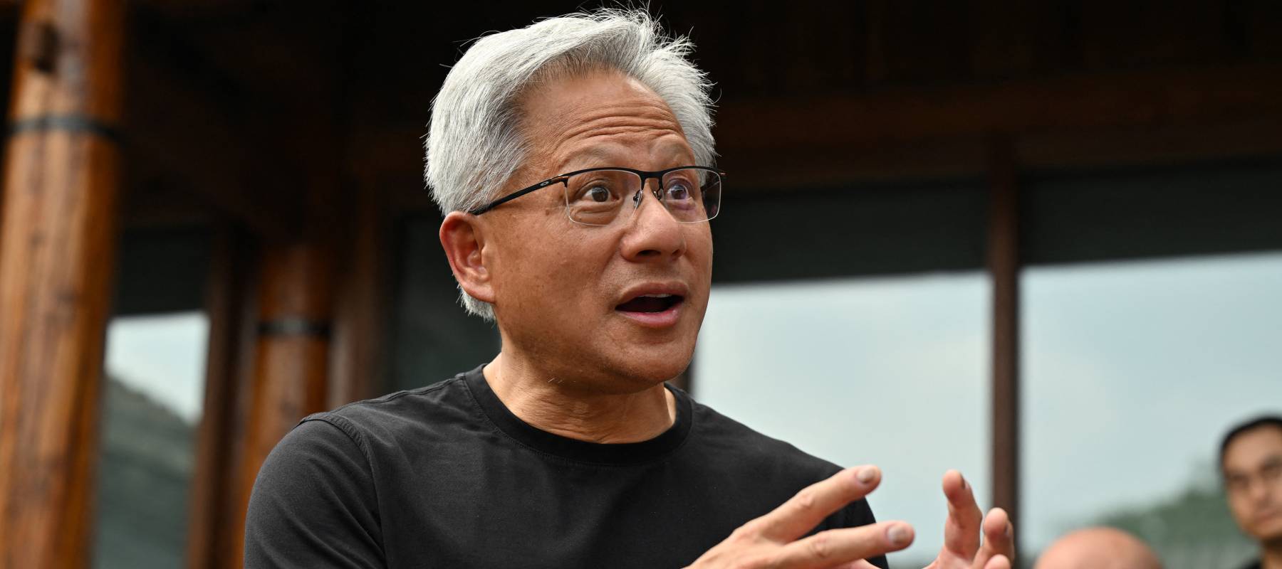 Nvidia founder and CEO Jensen Huang speaks to the media at a hotel in Beijing, July 16, 2025.