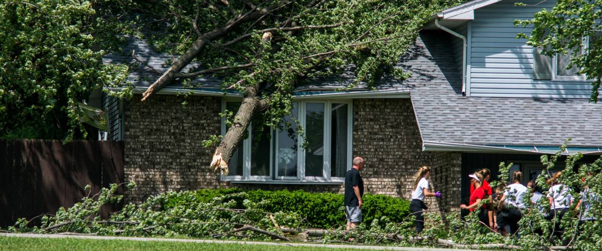 Ft Dodge Iowa United States-5/17/2017 Tree that fell on a house in Fort Dodge Iowa after a big storm