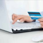 Close up of female hands making online payment