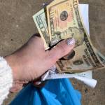 Woman holding cash