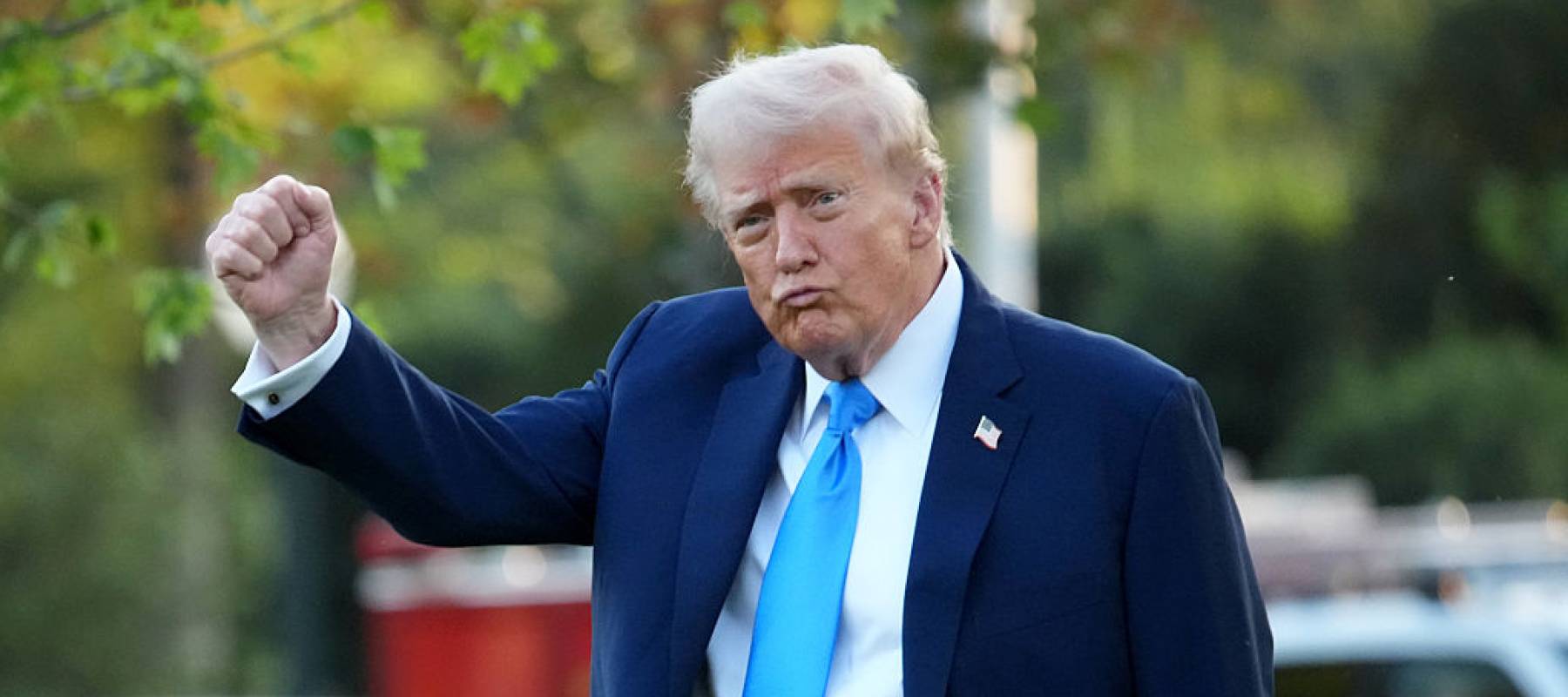 U.S. President Donald Trump gestures as he departs the White House on September 22, 2025