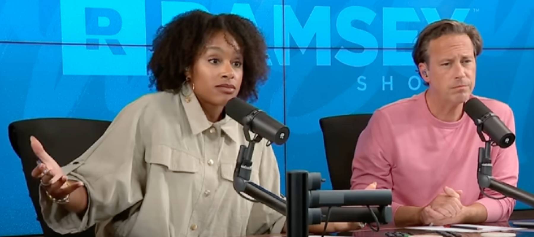 Ramsey Show hosts listen to caller.