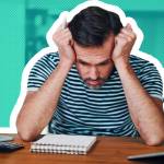 Stressed man trying to budget