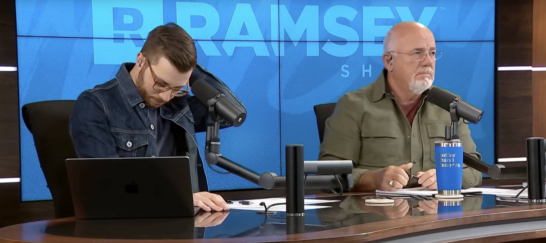 The Ramsey Show host Dave Ramsey (right) and co-host George Kamel (left) speak with Mark, 65, from North Carolina.