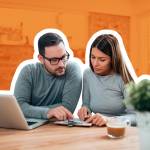 Couple doing finances at home.