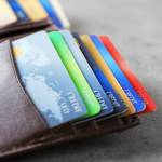 Credit cards in wallet on a white background.