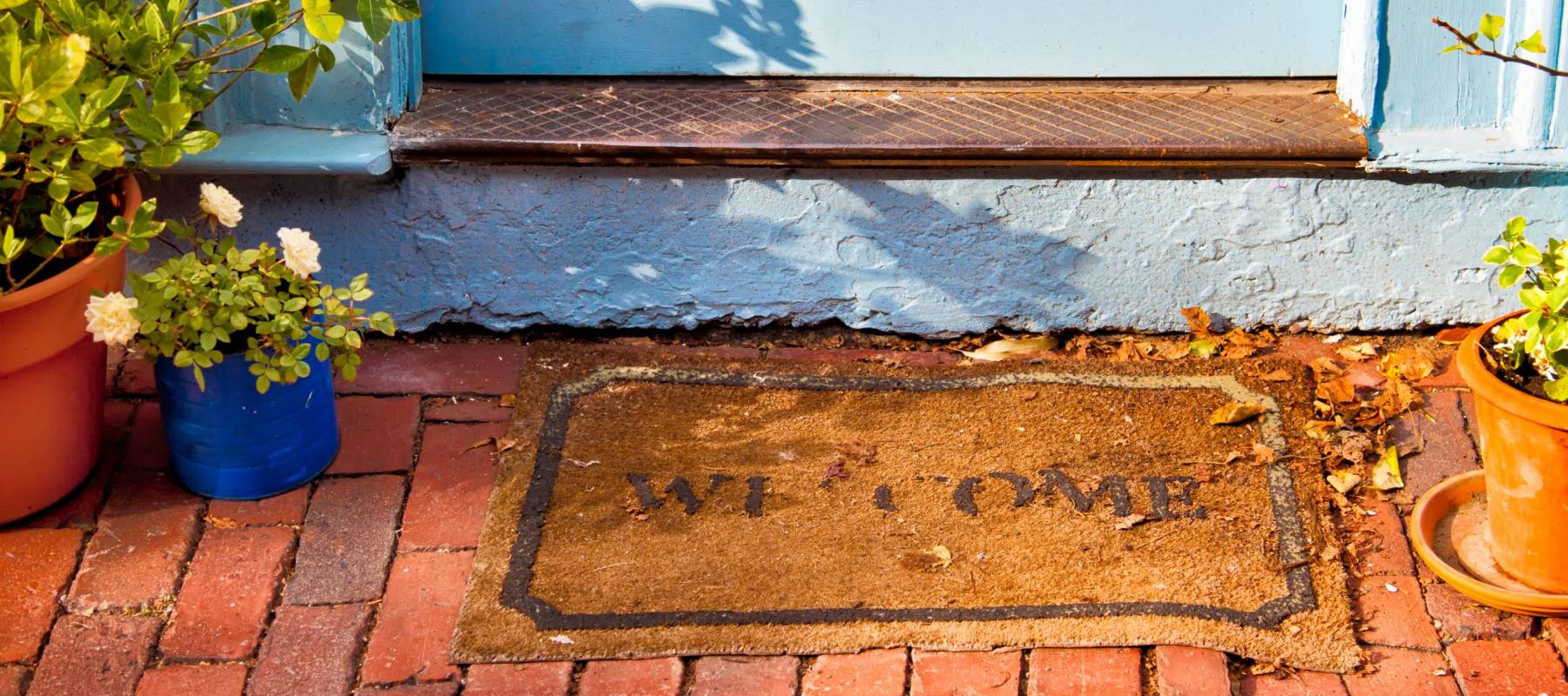 Messy exterior of the front of a home