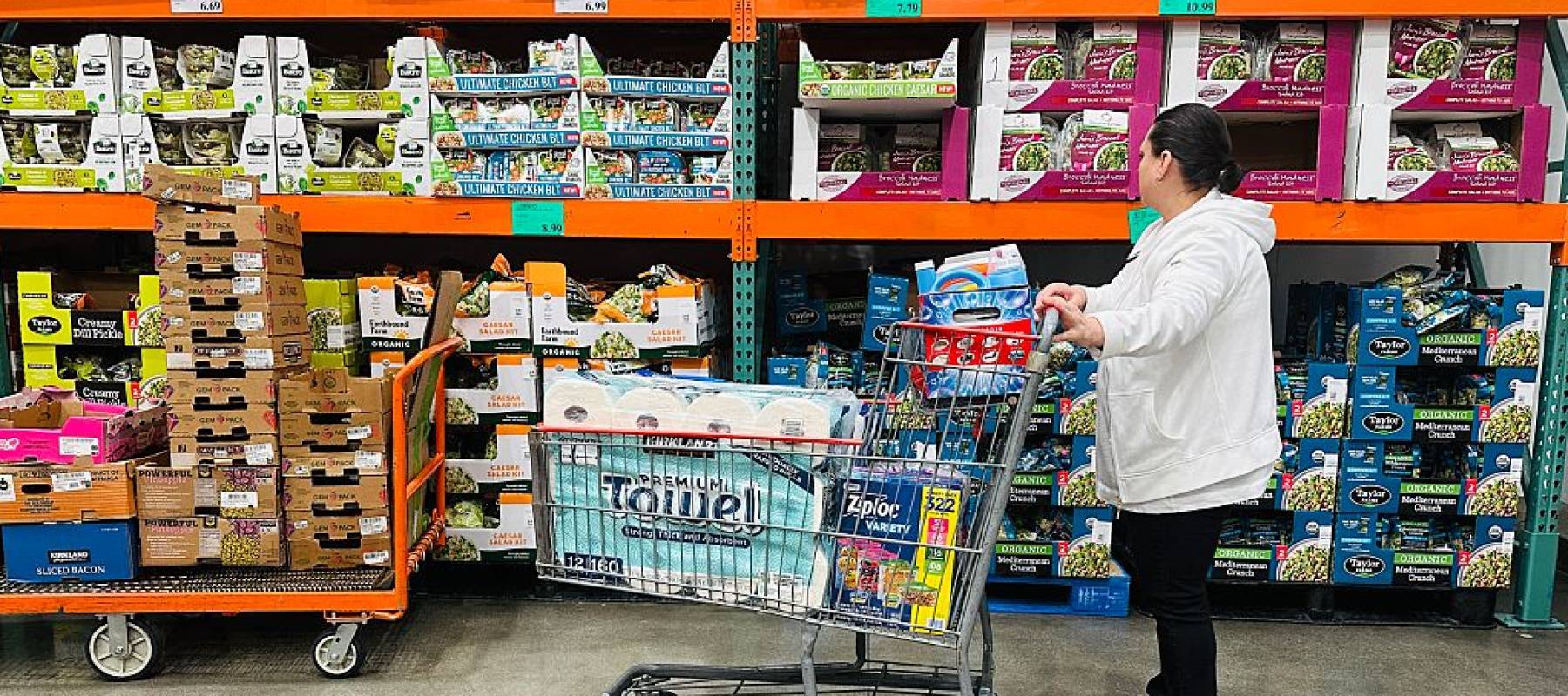 Woman at shelves in Costco.