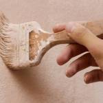 Hand painting a wall