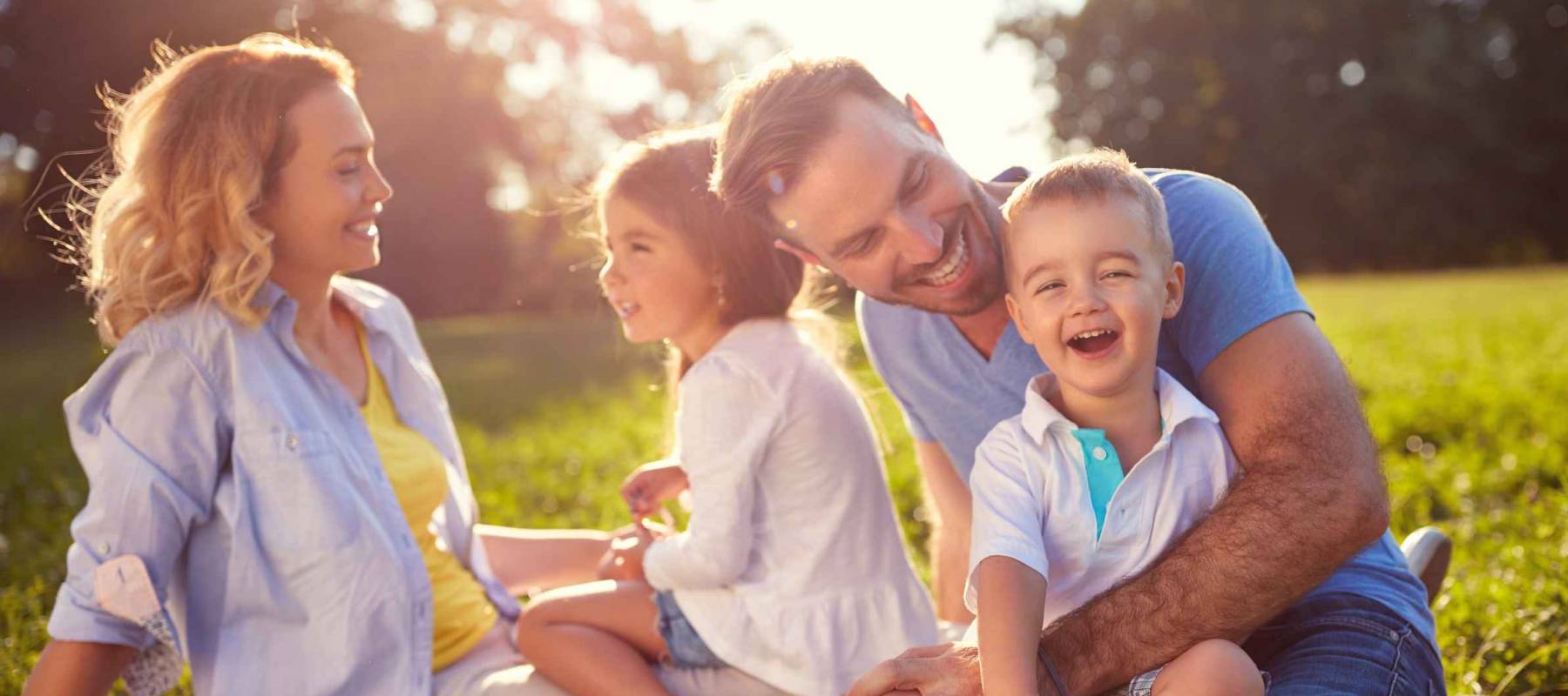 Young family with children having fun in nature