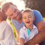 Young family with children having fun in nature