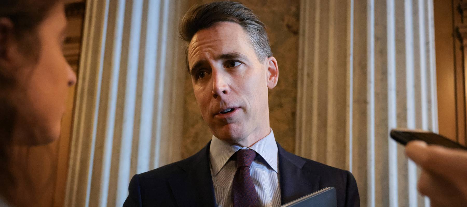 U.S. Sen. Josh Hawley (R-MO) speaks with press at the Senate Chambers.