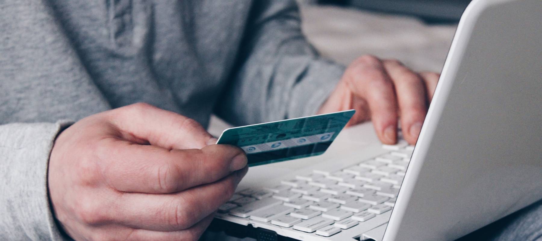 Hand holding credit card