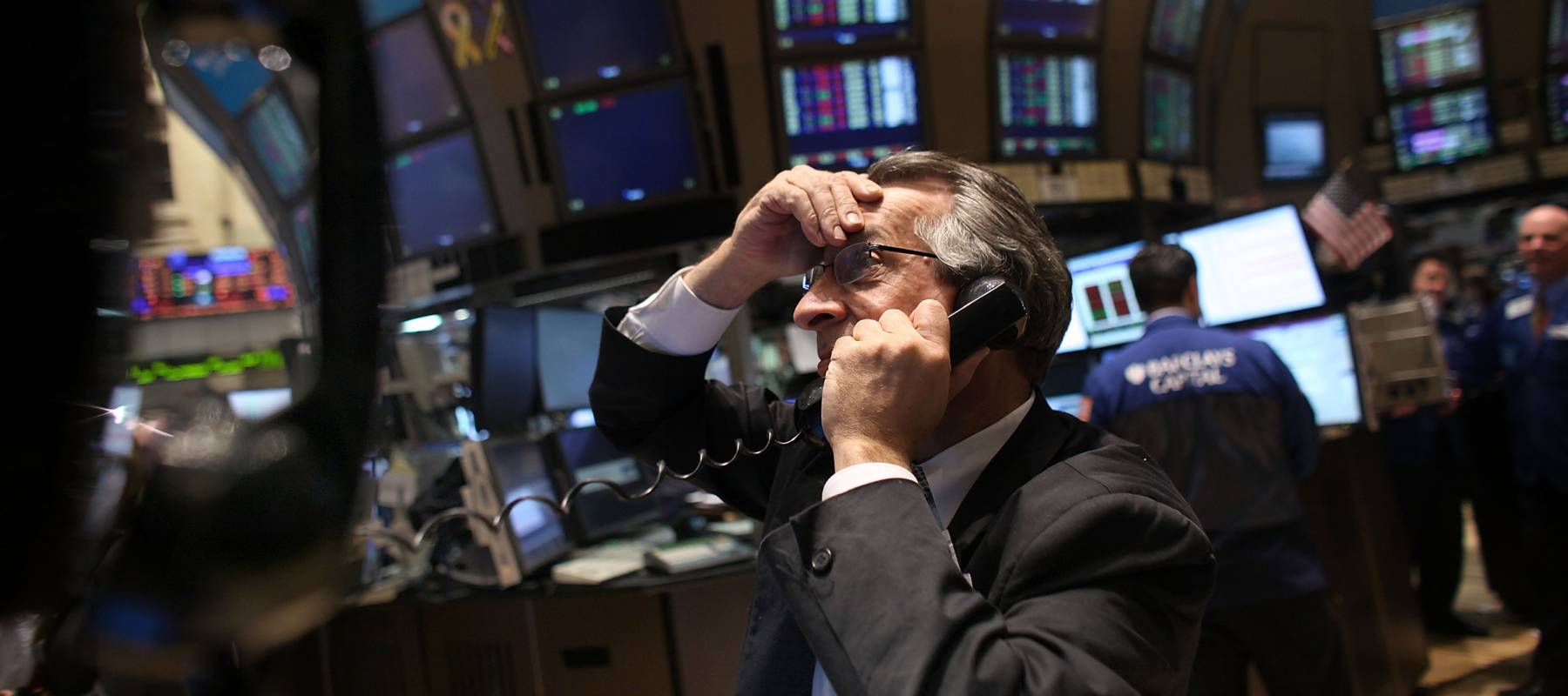Traders work on the floor on the New York Stock Exchange on April 18, 2011 in New York City.