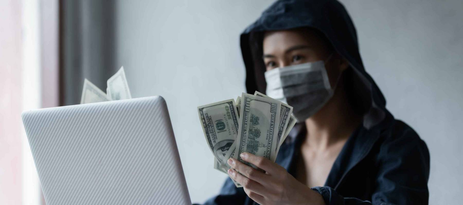 Hacker asia women stealing data success from online computer systems by using laptop. concept of business malware and hacker