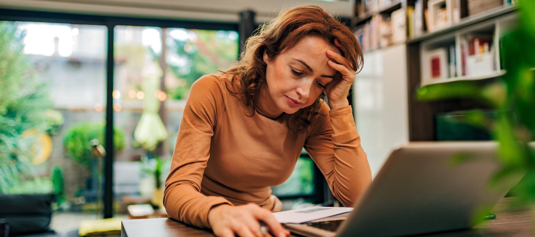 A stressed out middle-age woman.