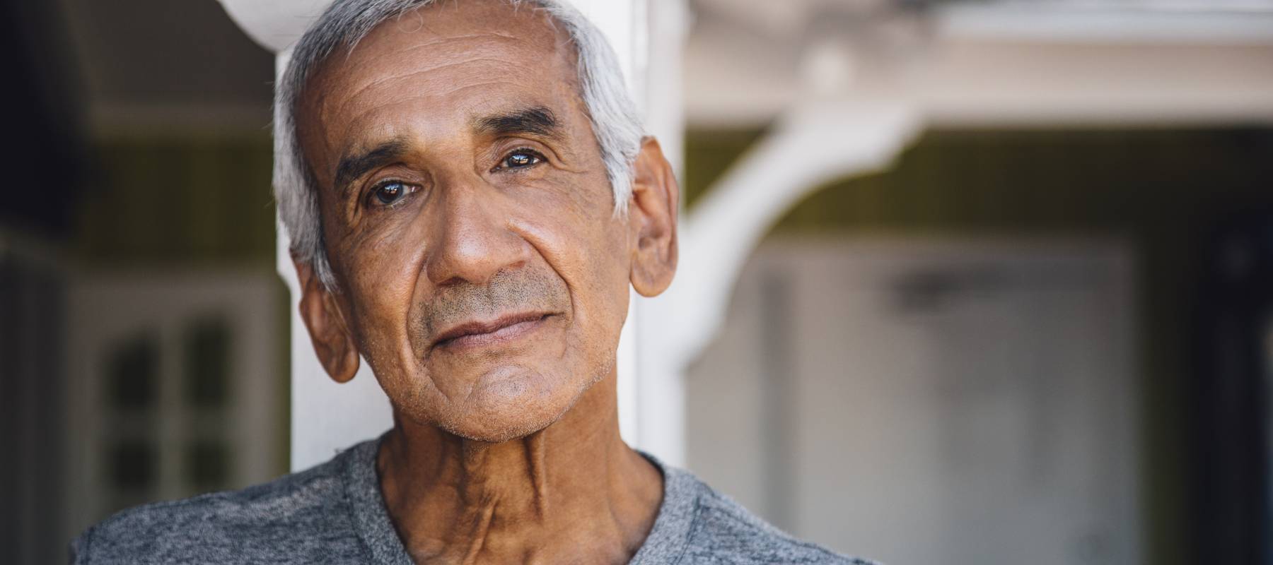 Portrait of senior Brown man, outdoors