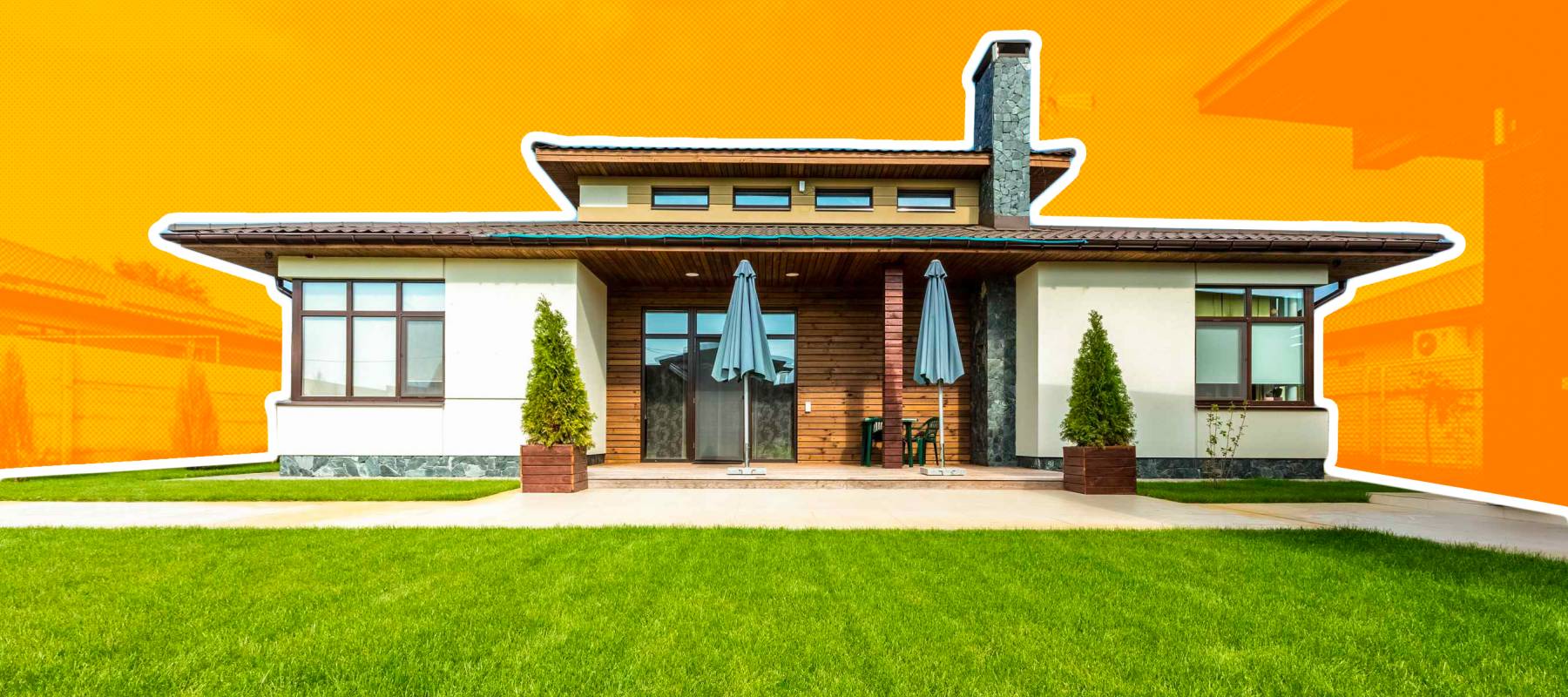 bungalow house seen from backyard, with lawn in foreground