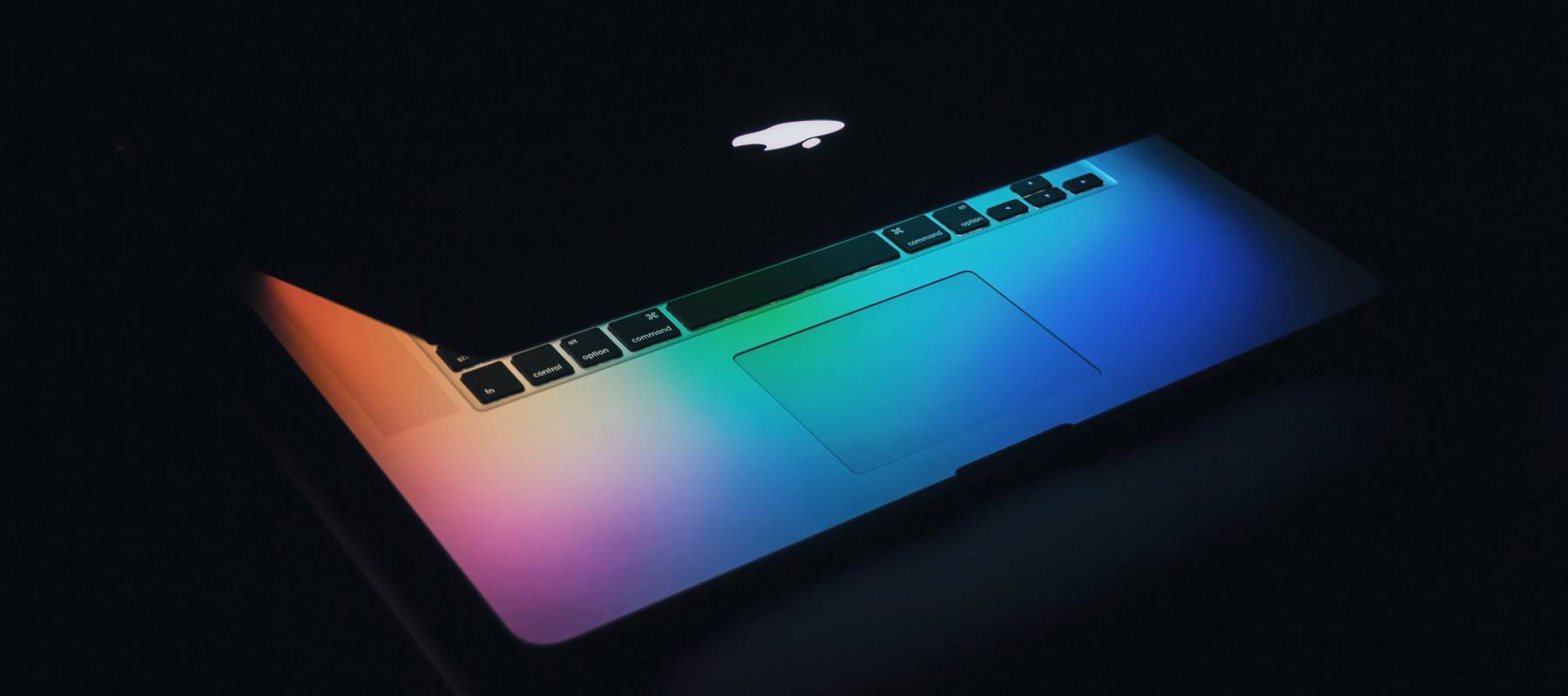 Successful professional casual man gesturing and checking cellphone messages towards city skyline. Entrepreneur enjoys success in job.