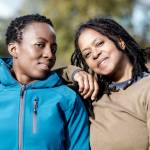 Two sisters taking a walk together.