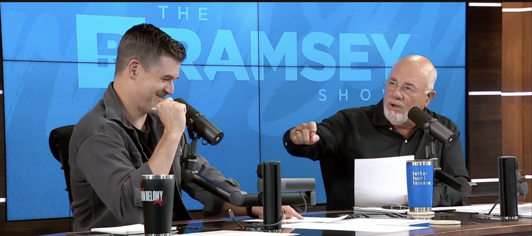 Dave Ramsey and co-host John Delony.
