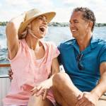 Older woman and man relaxing in the back of a pleasure boat