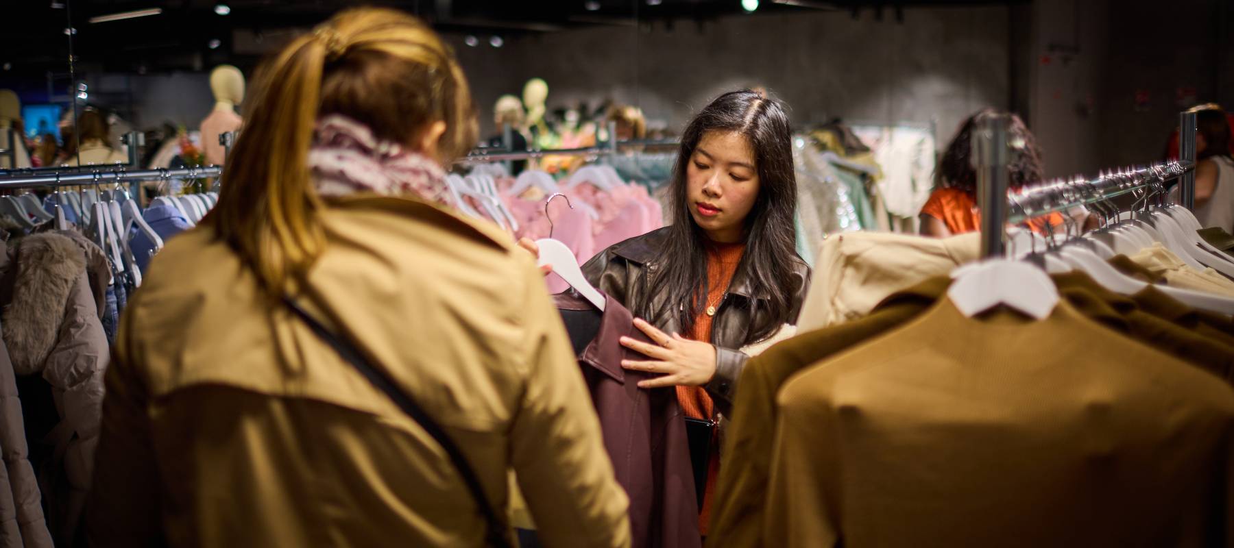 Shoppers browse in the first physical store of the Asian fast fashion brand Shein located in Paris, France, Nov. 5, 2025.
