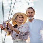 wealthy retired Caucasian couple on a yacht