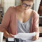 lady reading a paper