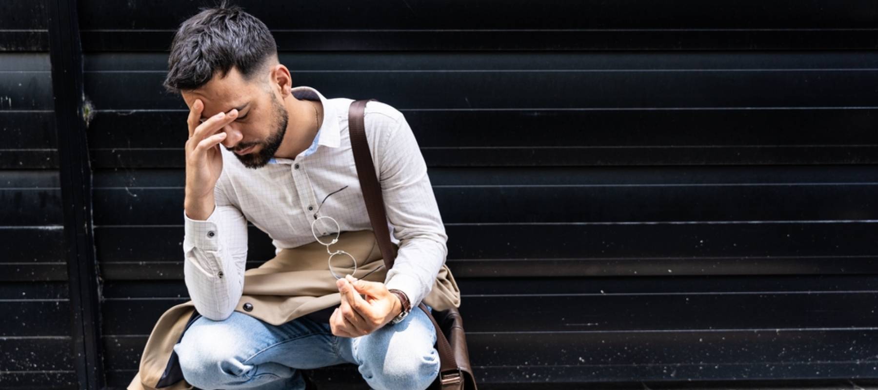 Young stressed and depressed businessman