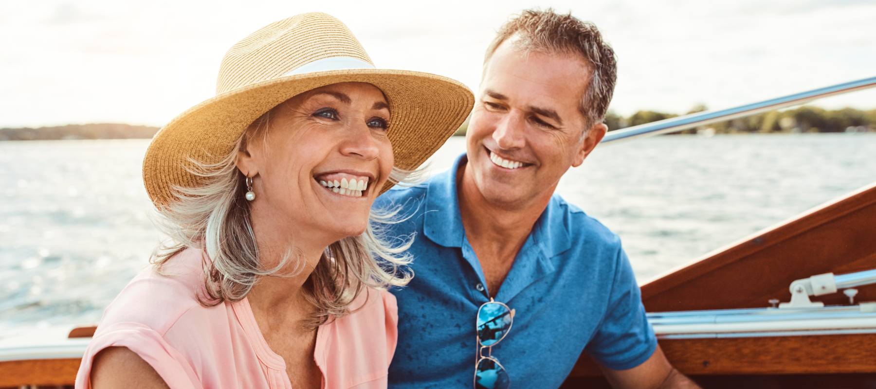 Older couple enjoying a boat ride.