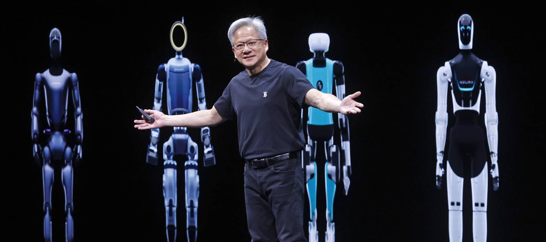 Nvidia CEO Jensen Huang attends the 9th edition of the VivaTech trade show and displays high-tech robots to a crowd.
