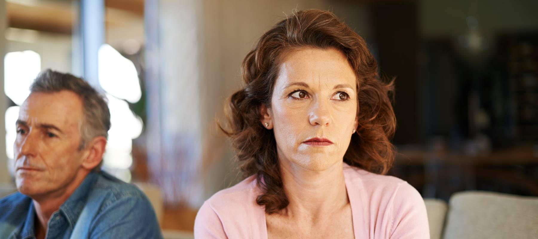 Middle aged couple weighs financial concerns