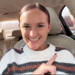 A woman sits in her car telling a story about bankruptcy on TikTok.