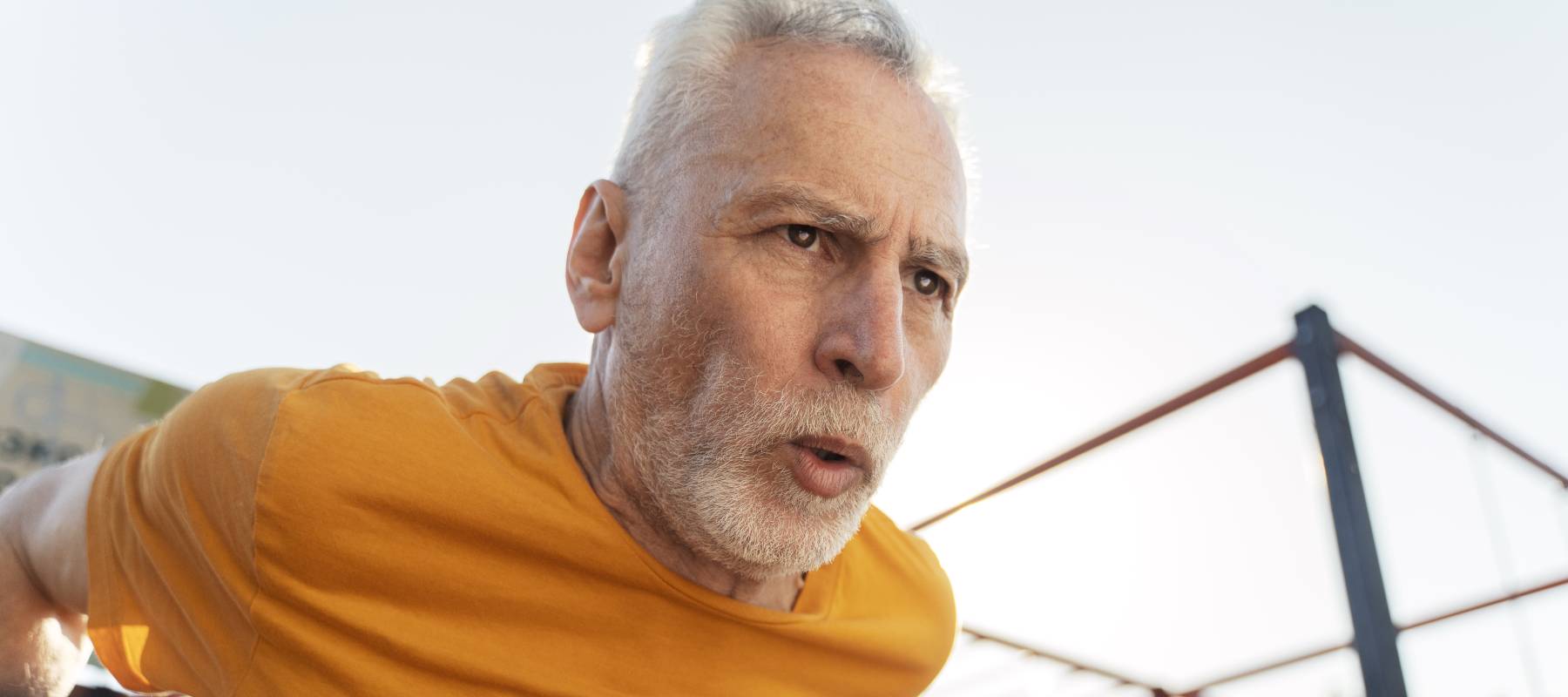 Older-aged adult male looking exasperated.