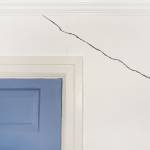 Crack in the wall of a home indicating foundation defects