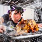 Funny Housewife overlooked roast chicken in the oven, so she had scorched (focus on chicken), view from the inside of the oven. Housewife perplexed and angry. Loser is destiny!