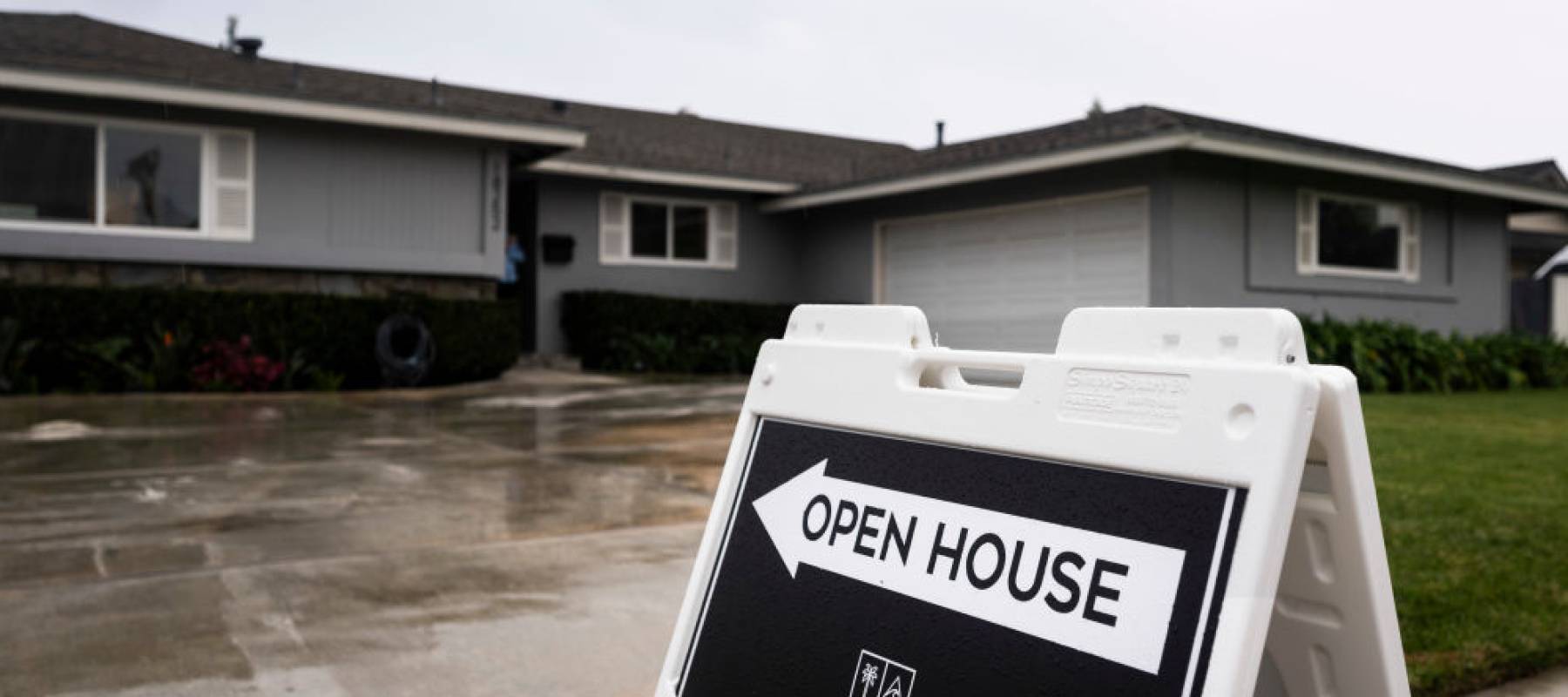 An open house sign in front of a home in Tustin, California.