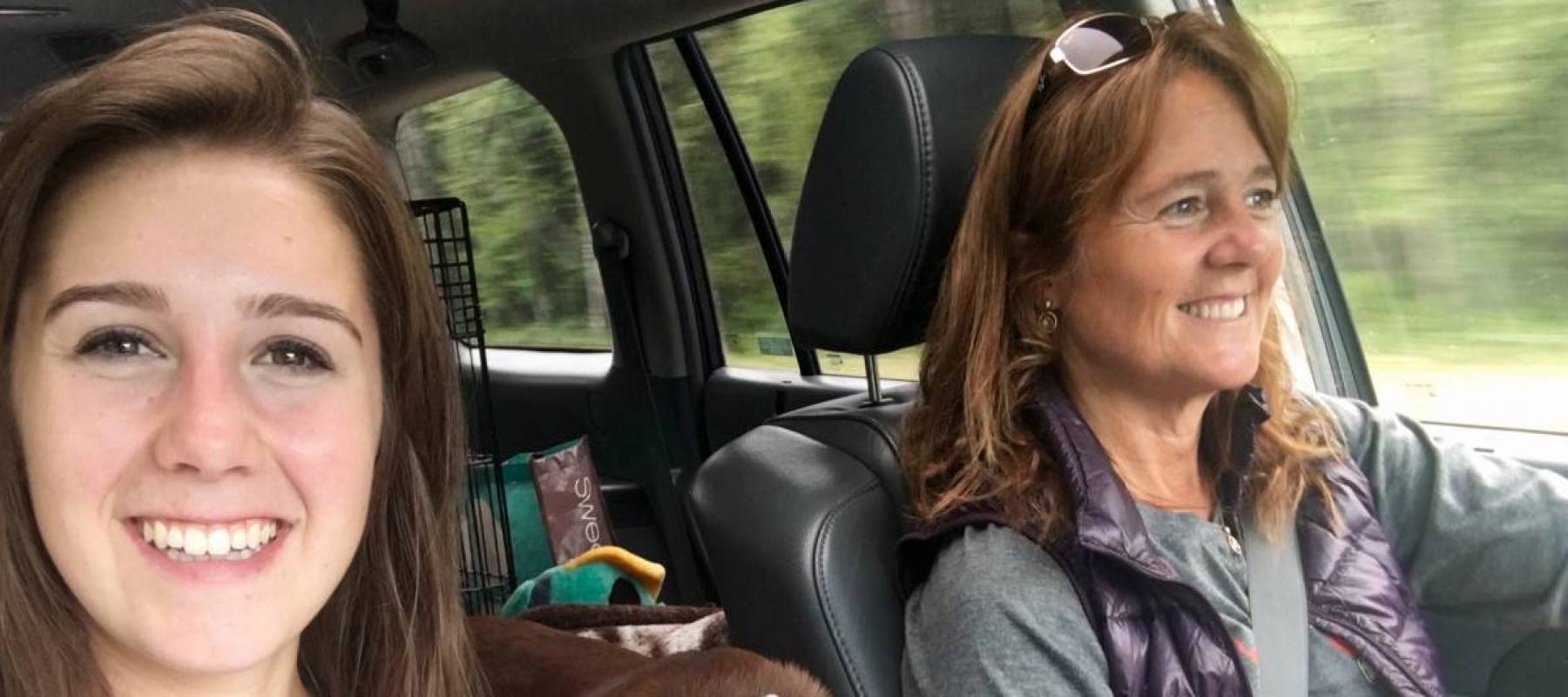 Mom and daughter driving
