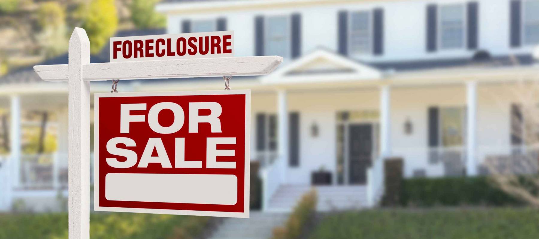 Right Facing For Rent Real Estate Sign In Front of House.
