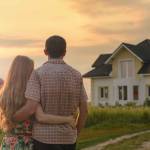 couple looking on house