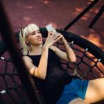 Young woman looking at iPhone