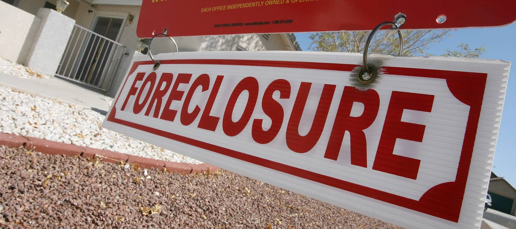 A sign hangs outside a foreclosed home July 29, 2008 in Las Vegas, Nevada.