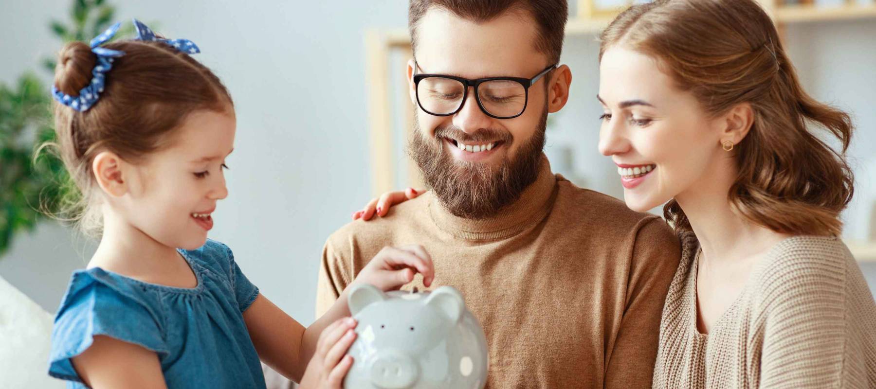 family savings, budget planning, children's pocket money. family with piggy Bank moneybox