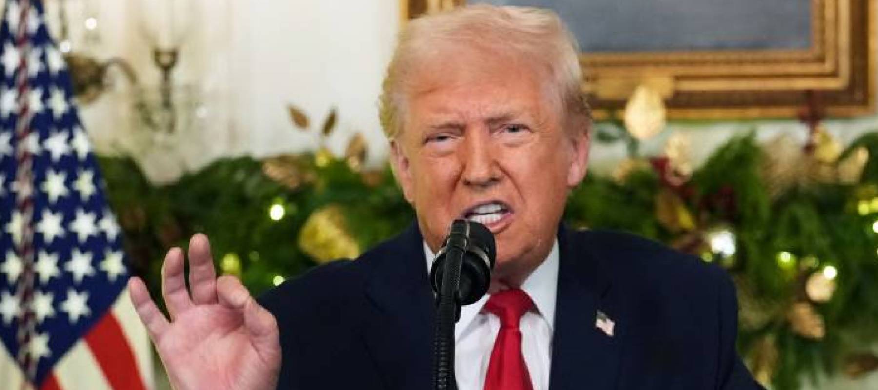 US President Donald Trump addresses the nation from the Diplomatic Reception Room of the White House in Washington, DC, on December 17, 2025.