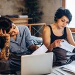 Women going through their bills