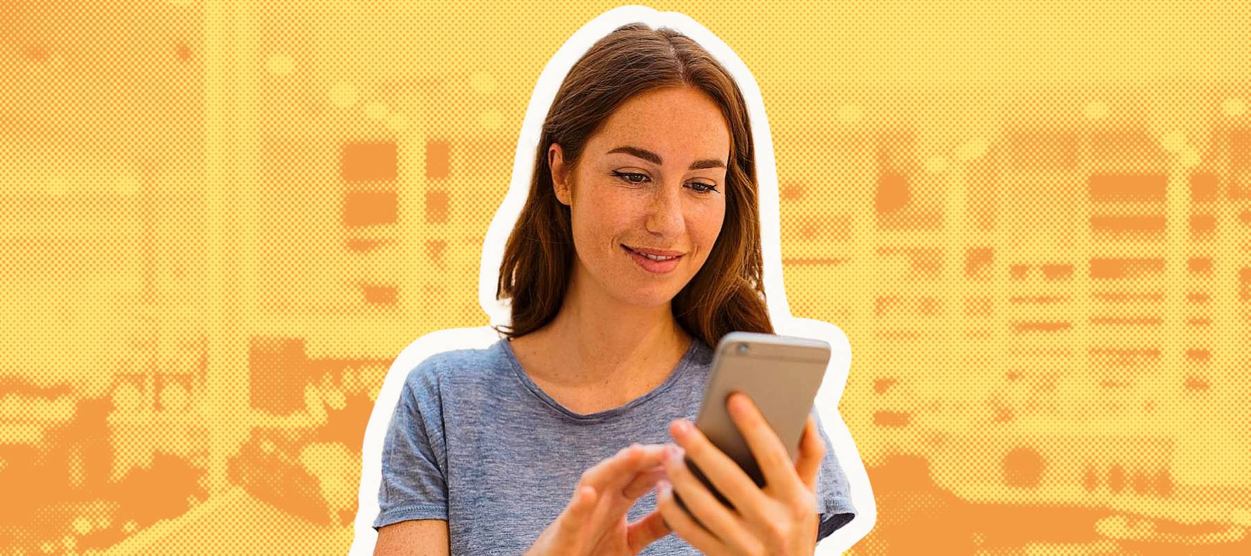 Woman using phone at store