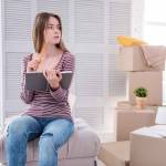 Woman thinking in new apartment