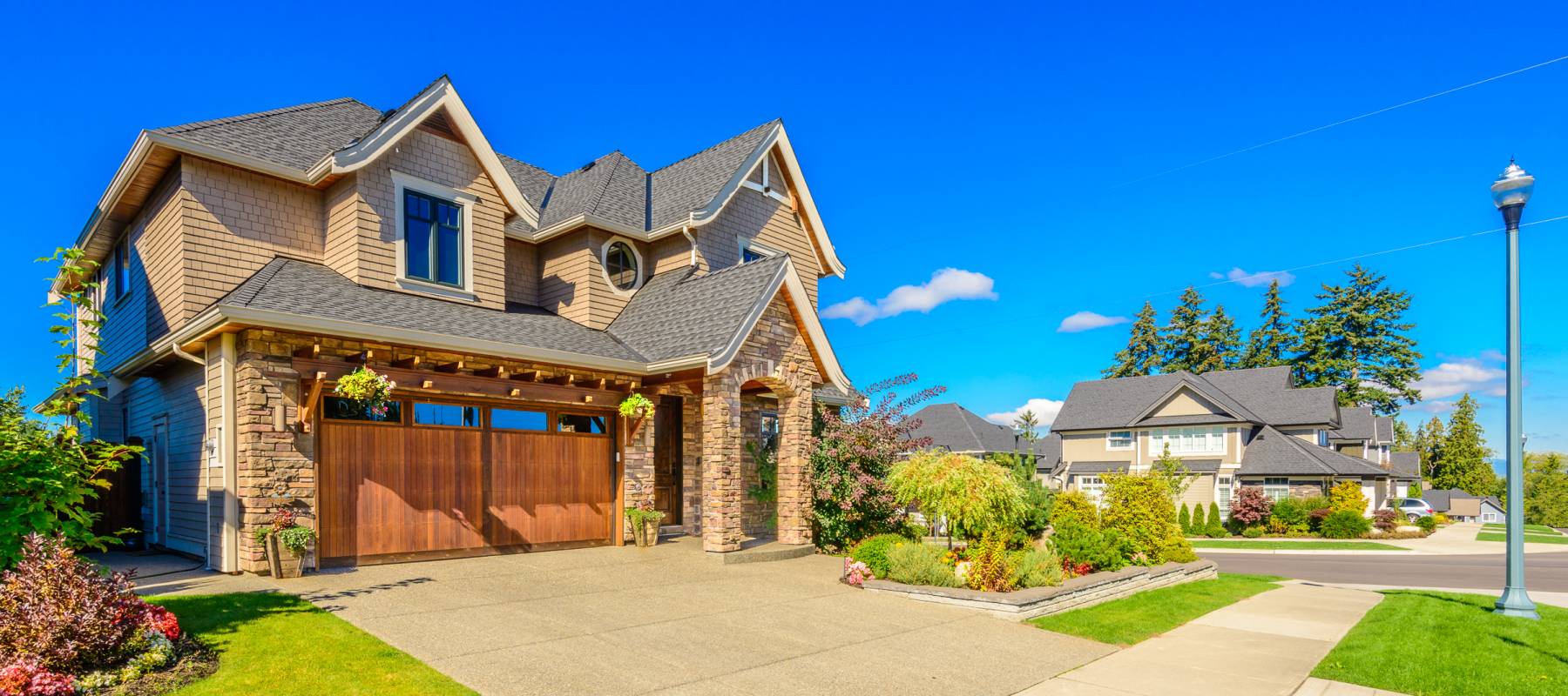 A perfect neighborhood. Houses in suburb at spring in the north America.